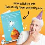 Alternative Product Image: Older woman in a party hat looking thoughtfully at a birthday card with a cupcake.