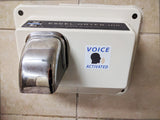 Alternative Product Image: "VOICE ACTIVATED" prank sticker on a hand dryer.