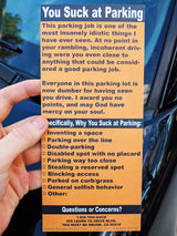 Alternative Product Image: Hand holding a "You Suck at Parking" prank note with a checklist of violations.