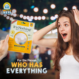 Alternative Product Image: Woman reacting with surprise as a hand presents "It's Nothing!" gag gift at an outdoor event.