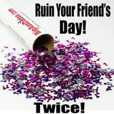  Other Image: Confetti shaped like penises spilling from a tube labeled "BigAssDildos.com".