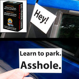 Alternative Product Image: "Bad Parking Cards" prank gift box shown with a "Hey!" sticker and a hand holding a "Learn to park. A**hole." card near a car.
