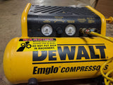 Alternative Product Image: "WARNING Moving parts present serious risk to d*cks. DO NOT PUT D*CK IN MACHINERY." sticker on a yellow DeWalt air compressor.