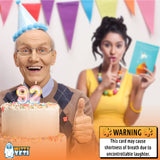 Alternative Product Image: Elderly man with a birthday cake and candles, a woman reacting to a card in the background.